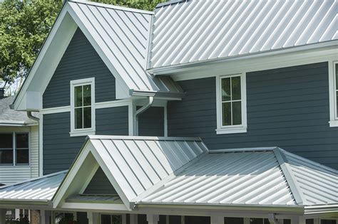 white house with gray metal roof|white colored aluminum roof sheet.